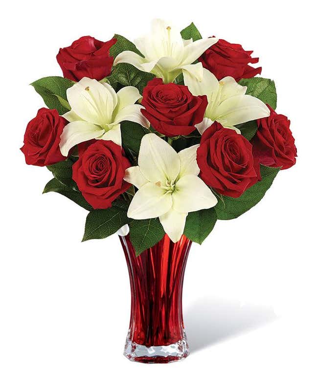 Red roses, white lilies in a vase