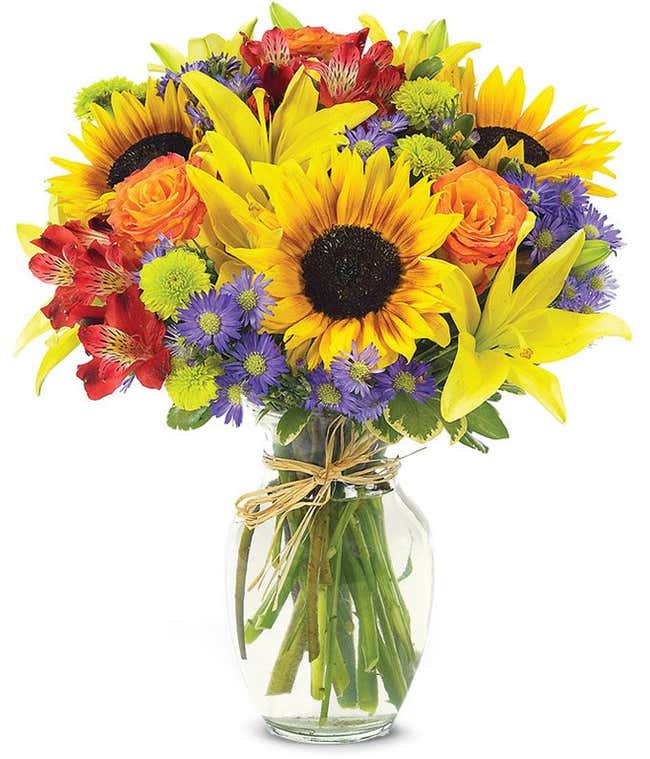 Sunflowers, yellow lilies and red alstroemeria